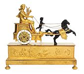 An Empire style chariot clock depicting the god and his lyre. France, c. 1815.