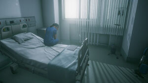 Mia in hospital after being diagnosed with lung cancer