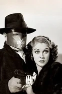 Warren Hull as the Green Hornet and Anne Nagel as Lenore Case in The Green Hornet Strikes Again!