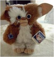 Gizmo as a lovable plush doll.