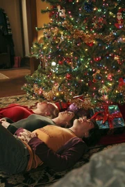 Izzie, Meredith y George en Navidad.