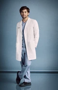 Jake Borelli como Levi Schmitt