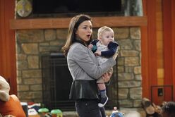 Amelia holding her nephew.