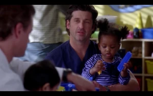 Derek Shepherd (with Zola)