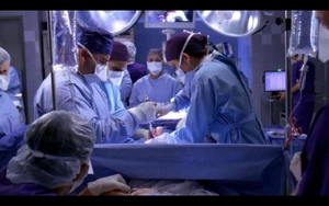 OR Nurse (center)