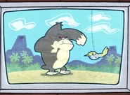 The Whatsit fighting Gorillasaur.