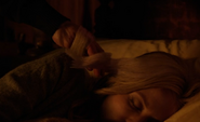 314-Adalind's hair wrapped around Meisner's hand