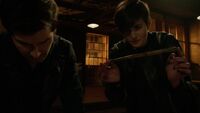 5x20-Trubel holds the stick.jpg