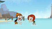 Corey and Laney splashing each other with water.jpg