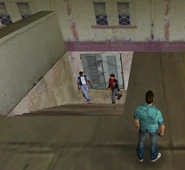 An example of pedestrians walking towards the exterior of the print works.