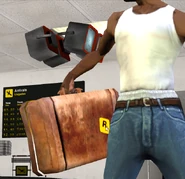 CJ's Briefcase with the Rockstar logo on it.