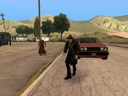 Mr. Trenchcoat pursuing while brawling.