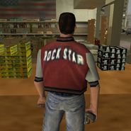 The Ammu-Nation clerk, wearing a Rockstar jacket.