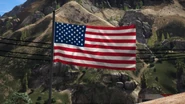 A flag of the United States with 50 stars in Paleto Bay, which is the biggest evidence against this theory but does not necessarily disprove it