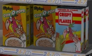 Caixas de Cok O Pops, e Crispy Flakes.