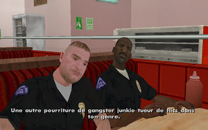 Frank Tenpenny (à droite) désigne sa cible à Carl Johnson au début de la mission dans GTA San Andreas.