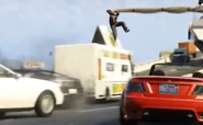 Фургон Тако во втором трейлере GTA V. Обратите внимание на ливрею Taco Libre