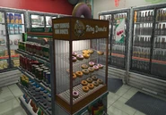 Uma máquina de Rusty Brown's Ring Donuts na 24/7.