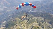 Michael parachuting over the vineyards.