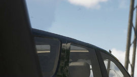 A shot of the SUV's roofline, pillars, and windows.