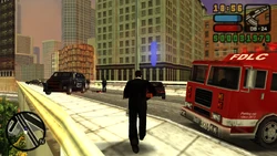 Sneaking towards the FBI Cruiser from behind the Fire Truck.