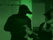 A gunman with night vision equipped during the Humane Labs raid.