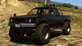 A Rebel in the original version of Grand Theft Auto V. (Rear quarter view)