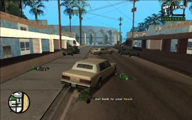 Just as they get into the car, two cars driven by Seville Boulevard boys emerge from around the flats.