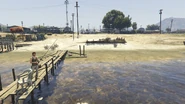SandyShores-GTAVe-ShorelineAndFisherman