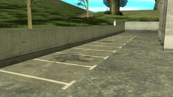 The parking lot at the back.