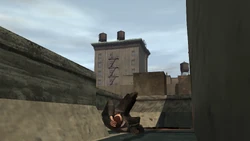 He dies from a bullet.