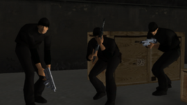 The trio hiding at Phil Cassidy's former depot shortly before the ambush.