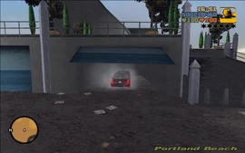 Claude parking the black limo in the garage.