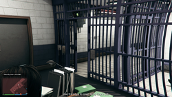 Use the keys to open King Tiny's cell.