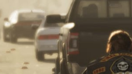 The rear of the sedan (white) in a screenshot from the Ambrosia section of the game's promotional website.