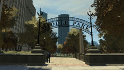 An eastern "Middle Park" entrance, with an obelisk bearing hieroglyphic visible in the background. The entrance into East Park station is also seen to the left.