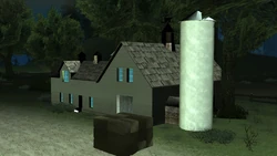 Front view of the farmhouse during the night, with glitched night vertex brightness on the window textures.