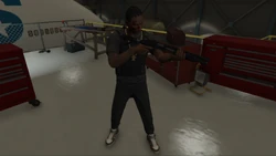 Johnny Guns armed with a 