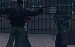 After Claude gives one of the Cartel gangsters the money, he is frisked and has his weapons taken away.