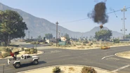 ShortTrip-FireItUp-GTAOe-LamarTakesDownVagosBuzzard.png (2.61 MB) Lamar shooting down a Vagos-owned Buzzard Attack Chopper.