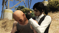 The GTA Online Protagonist helping GJ with an adrenaline shot.