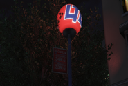 A rotating LTD Gasoline ball sign in GTA V.