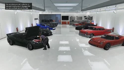 Opening GTA Online cutscene showing a mechanic in a 10-car garage.