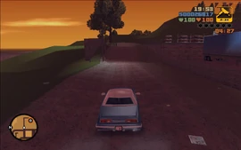 Claude arriving at 8-Ball's garage.