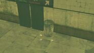 A trash can found in Manhunt with CJ Dick's initials sprayed on it.