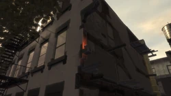 The flying rat on the demolished townhouse.