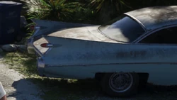 Another view of the 1959 Cadillac-inspired car in the , showing its rear badge