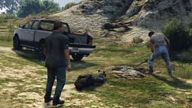 Antonia about to be buried alive by two kidnappers.
