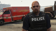 An LSPD officer featuring an LSFD Ambulance in the background.
