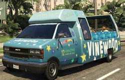 The Tour Bus in the original version of GTA V. Note the "12 Amazing ports of call!"